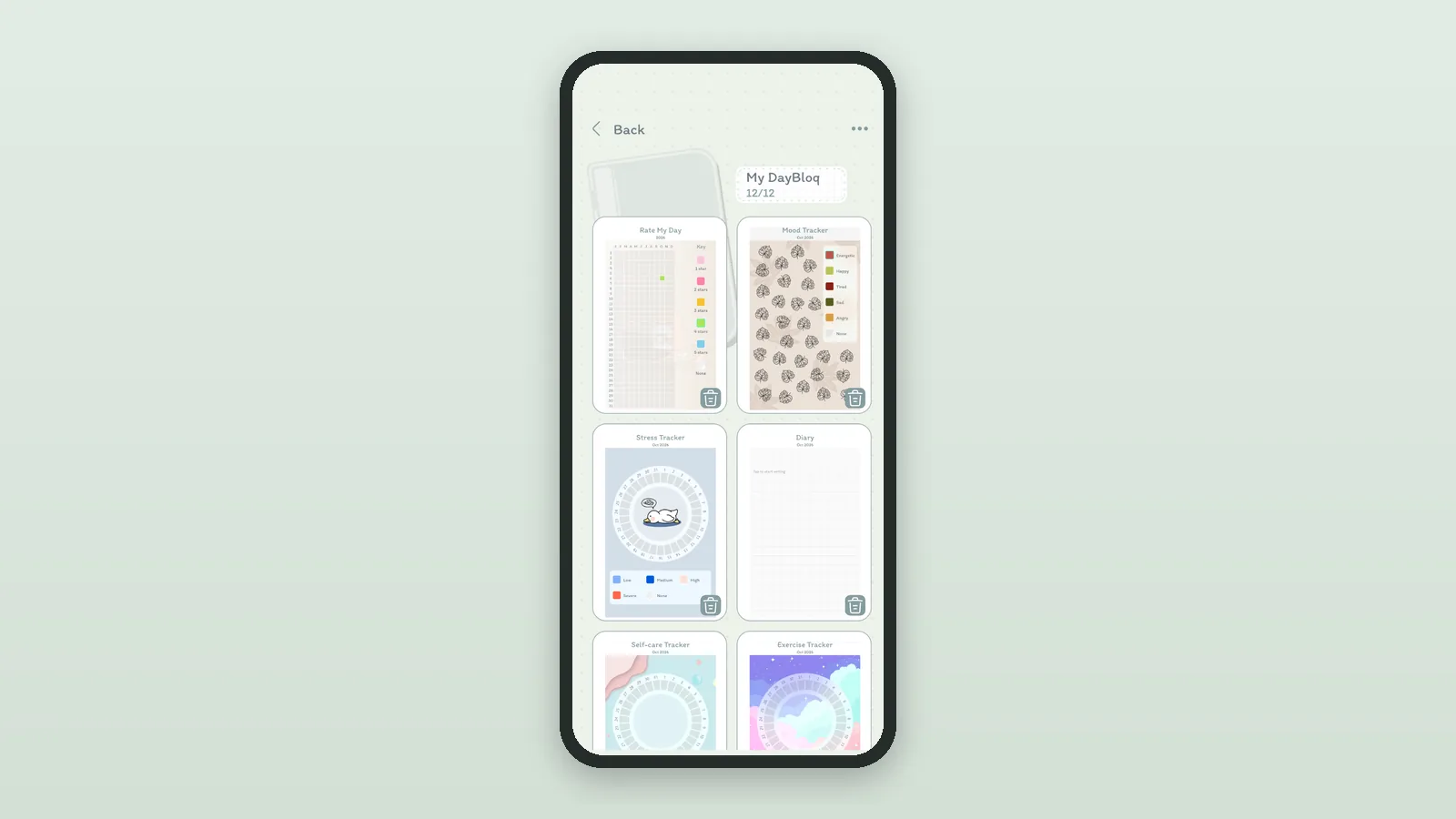 A DayBloq journal opened to all its pages: Rate My Day, Mood Tracker, Stress Tracker, Diary and more